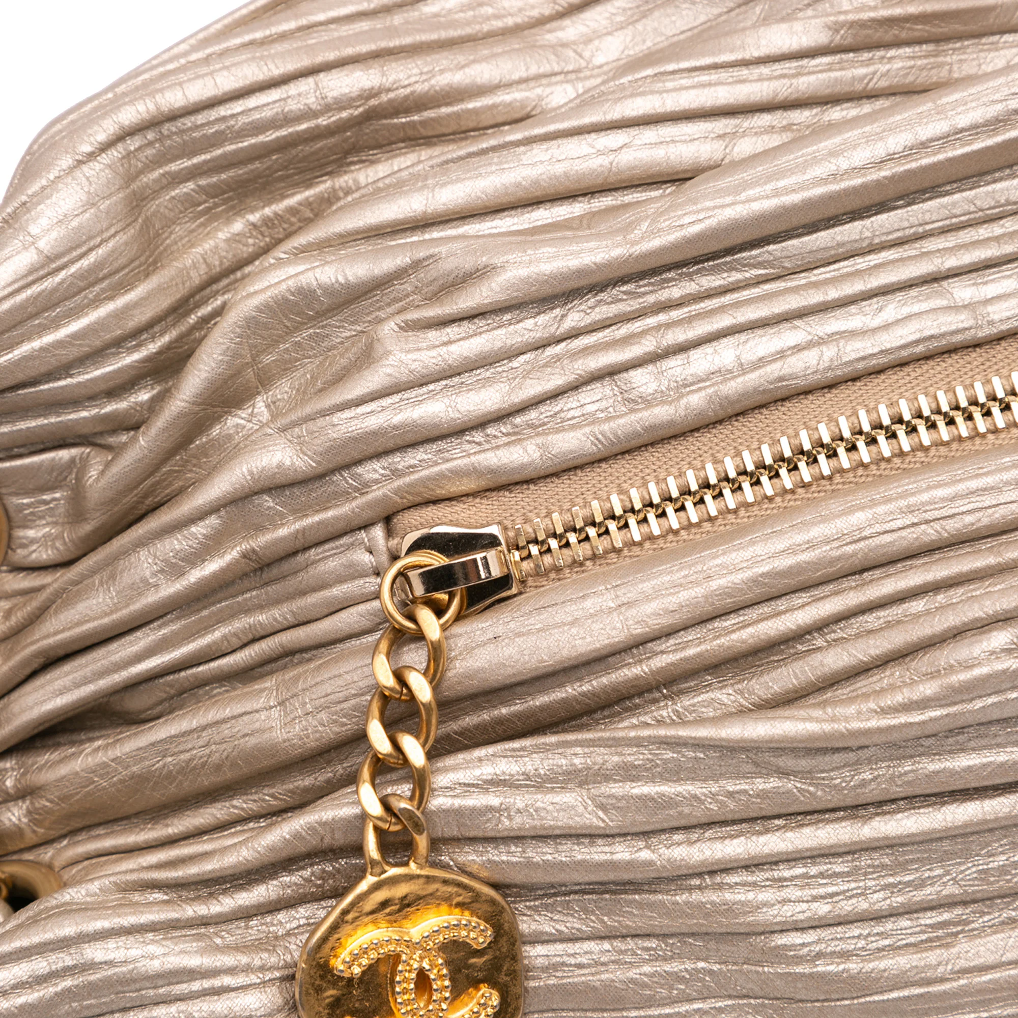 Chanel | Pre-Owned Medium Metallic Calfskin Coco Pleats Drawstring Backpack | Gold - Image 8